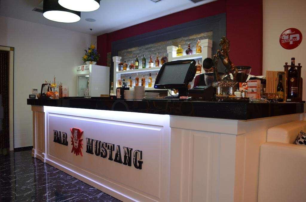Hotel Mustang Vasqarr Restaurante foto