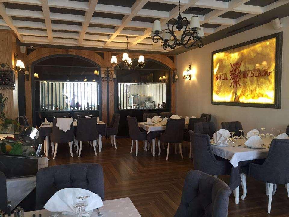 Hotel Mustang Vasqarr Restaurante foto